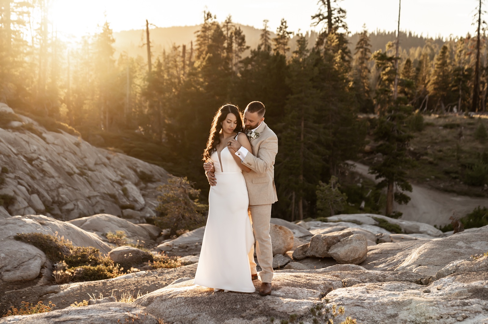 Bride and groom pose for sunset portraits at their Hideout at Kirkwood in California