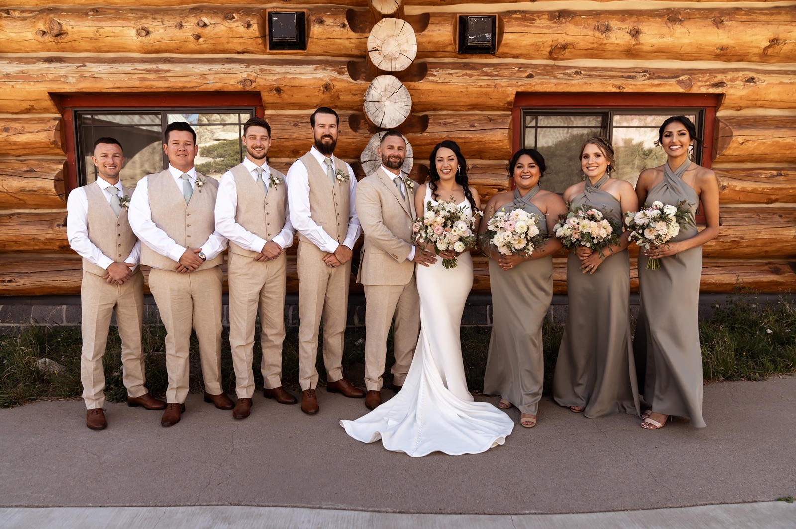 Couple with their wedding party at their Hideout at Kirkwood wedding