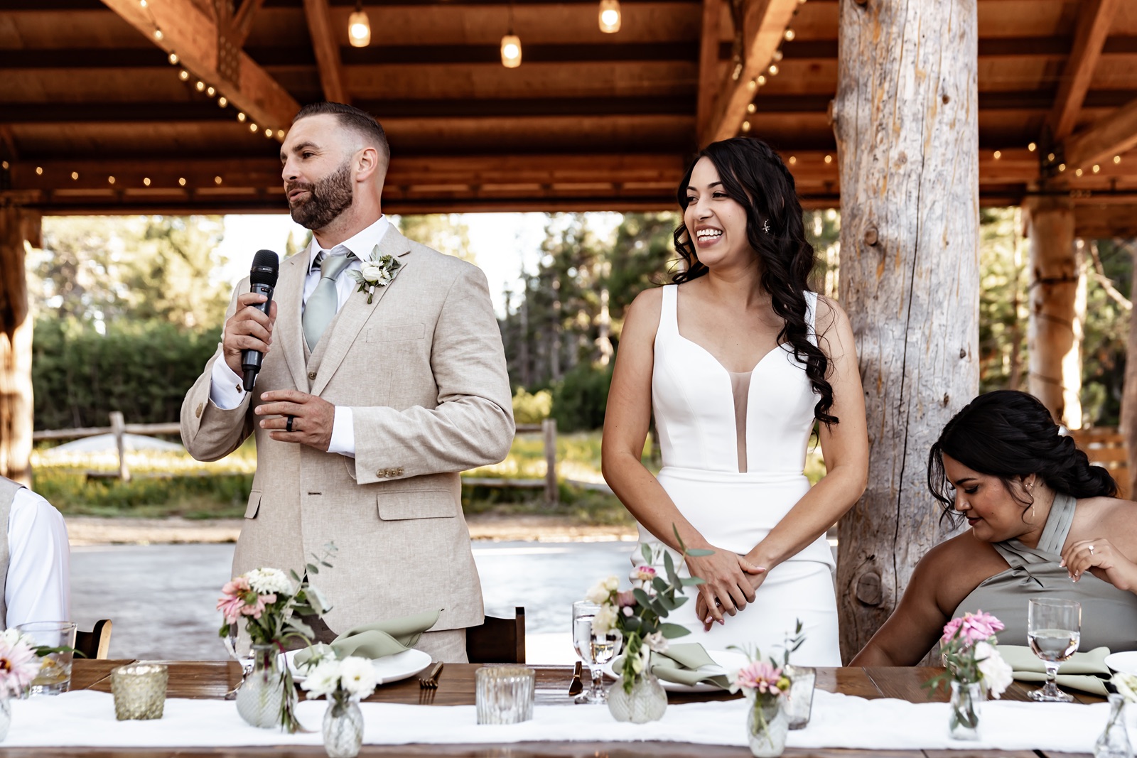 Bride and groom give a speech at their Hideout at Kirkwood in California wedding