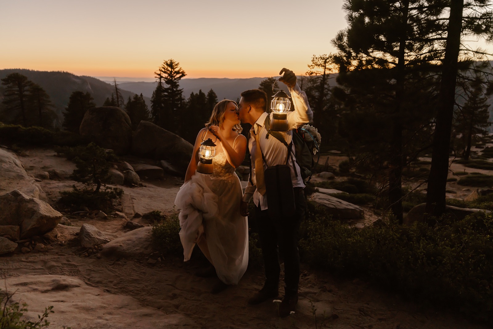 Couple holds lanterns at Yosemite elopement