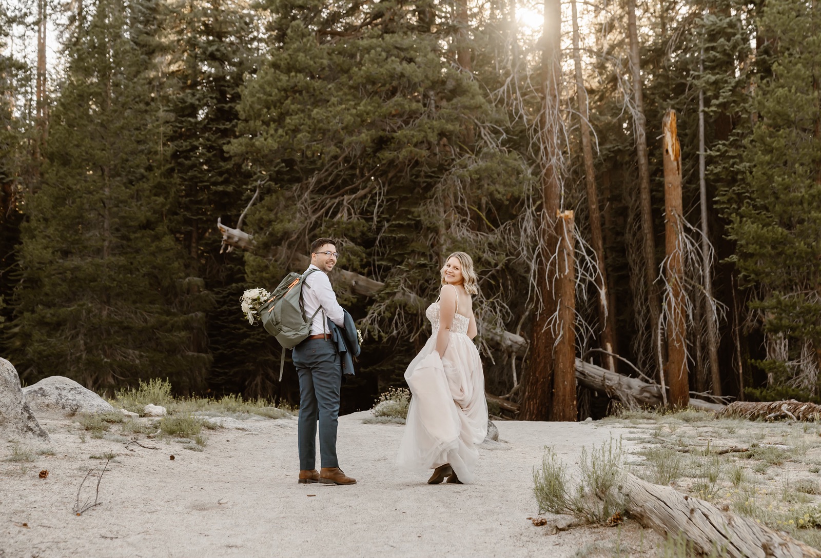 Bride and groom set out on Yosemite elopement hike