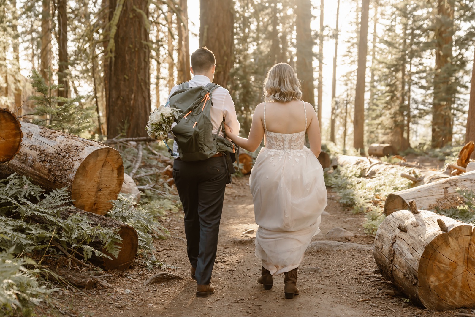 Bride and groom hiking at their Yosemite elopement