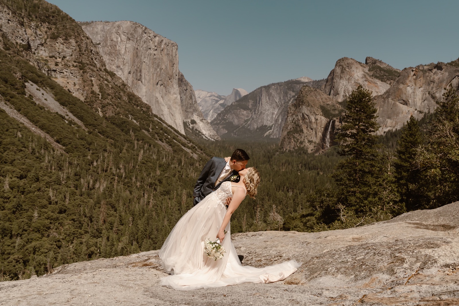 Bride and groom kiss at their Yosemite elopement