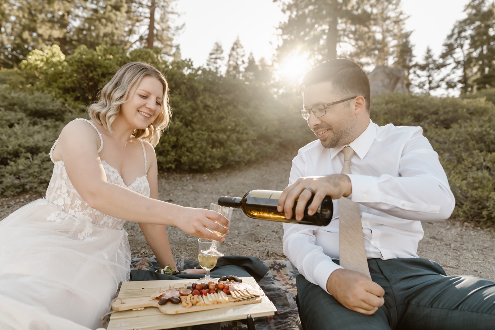 Bride and groom enjoy a picnic at their Yosemite elopement