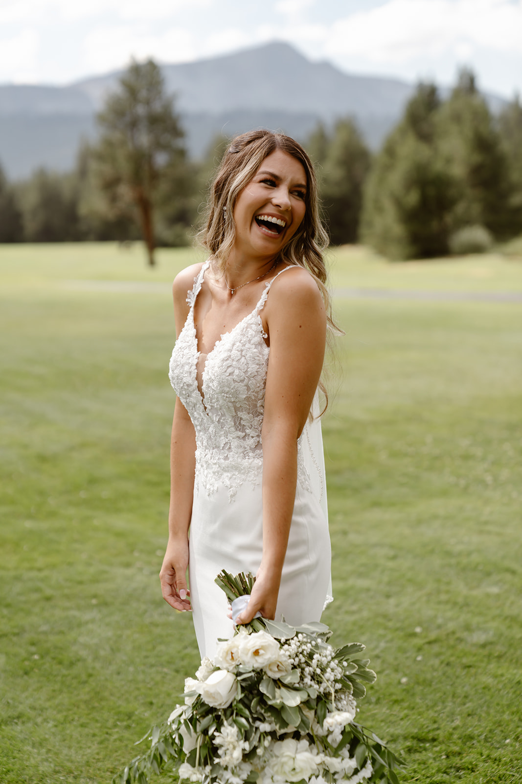 Bride smiles at her Lake Tahoe Golf Course wedding