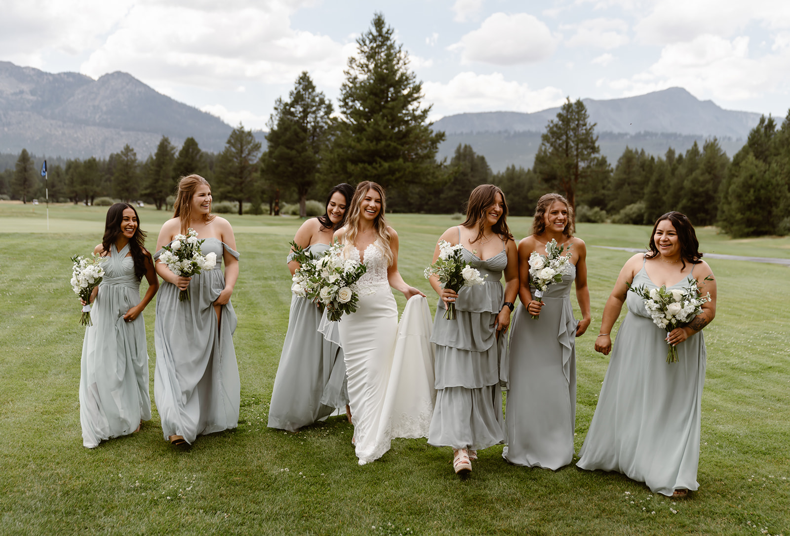 Bride and bridesmaids in green dresses at Lake Tahoe Golf Course