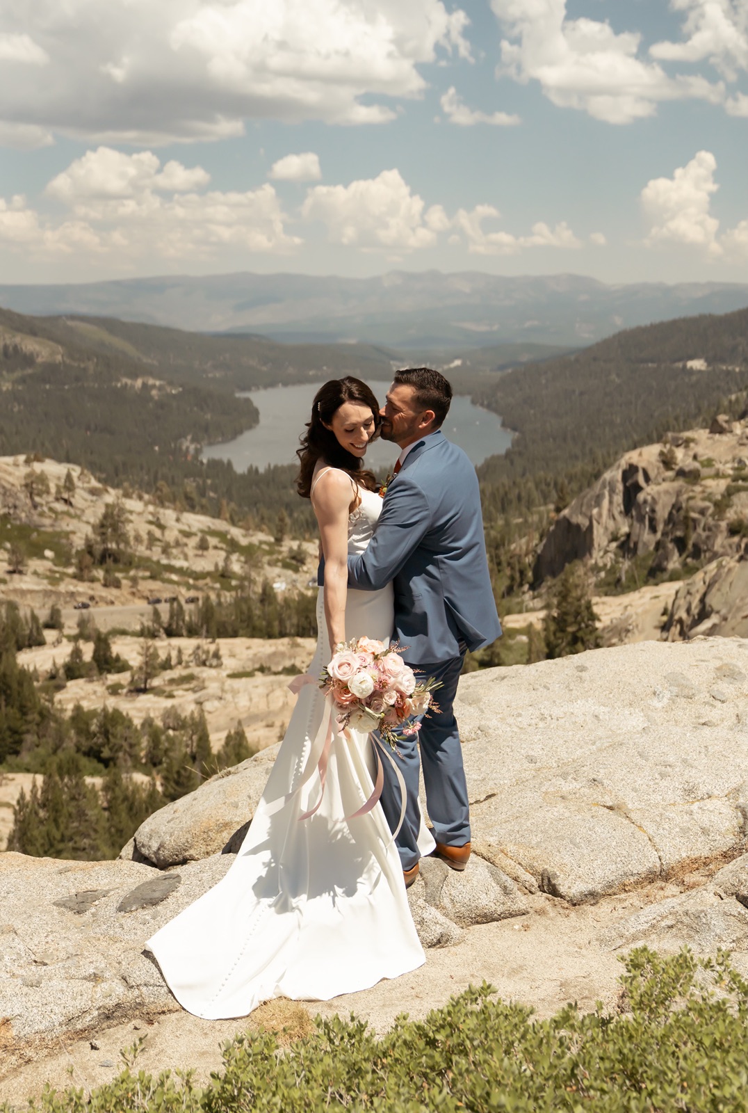 Bride and groom pose for bridal portraits at Donner Lookout