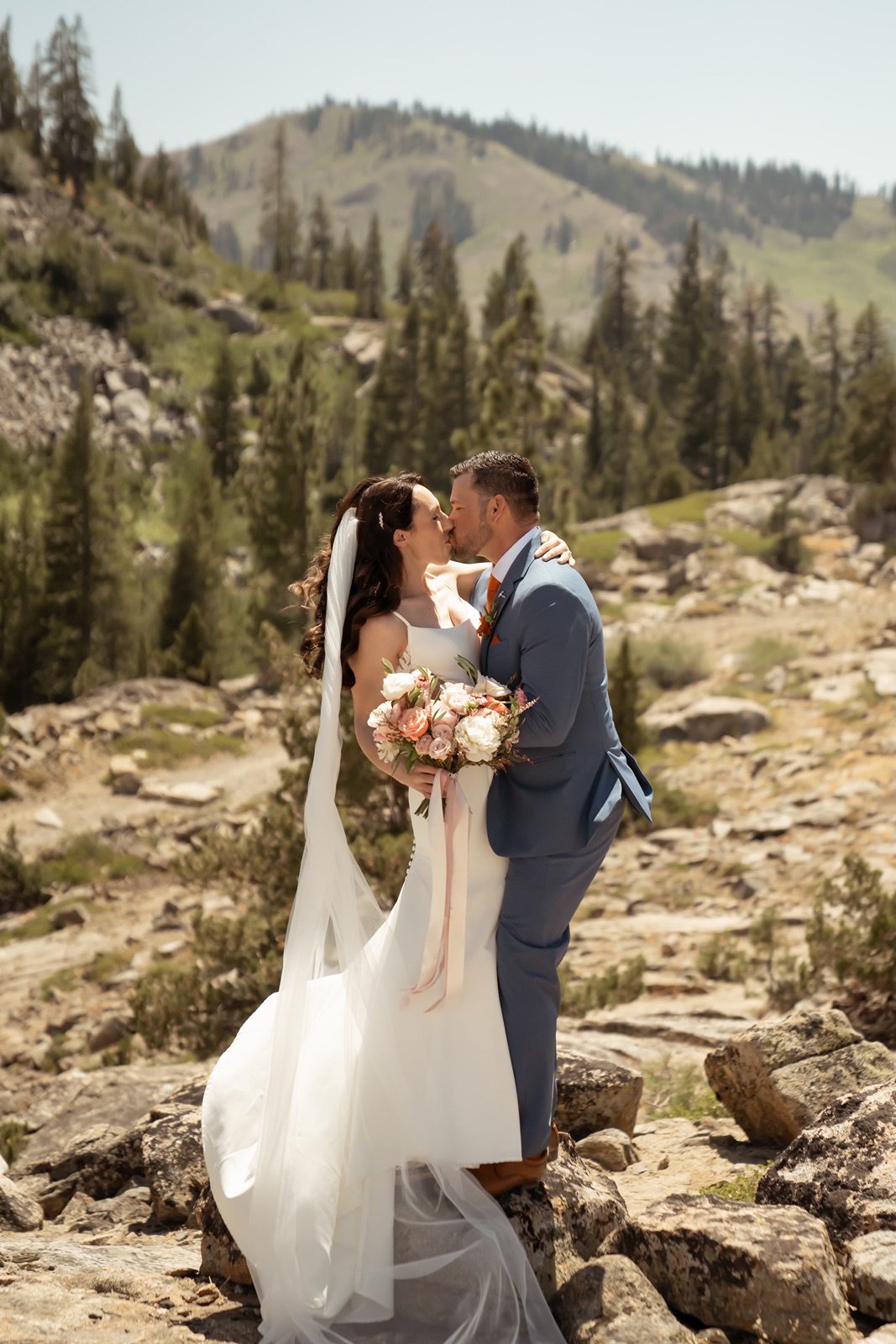 Bride and groom kiss at their Truckee wedding