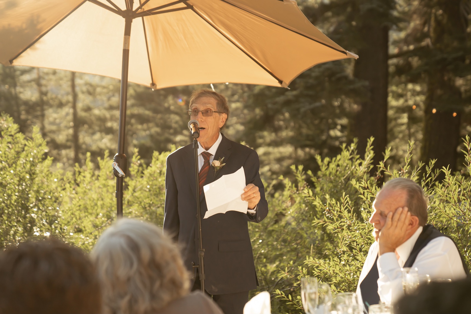 Father of the bride gives a toast at the Truckee wedding reception