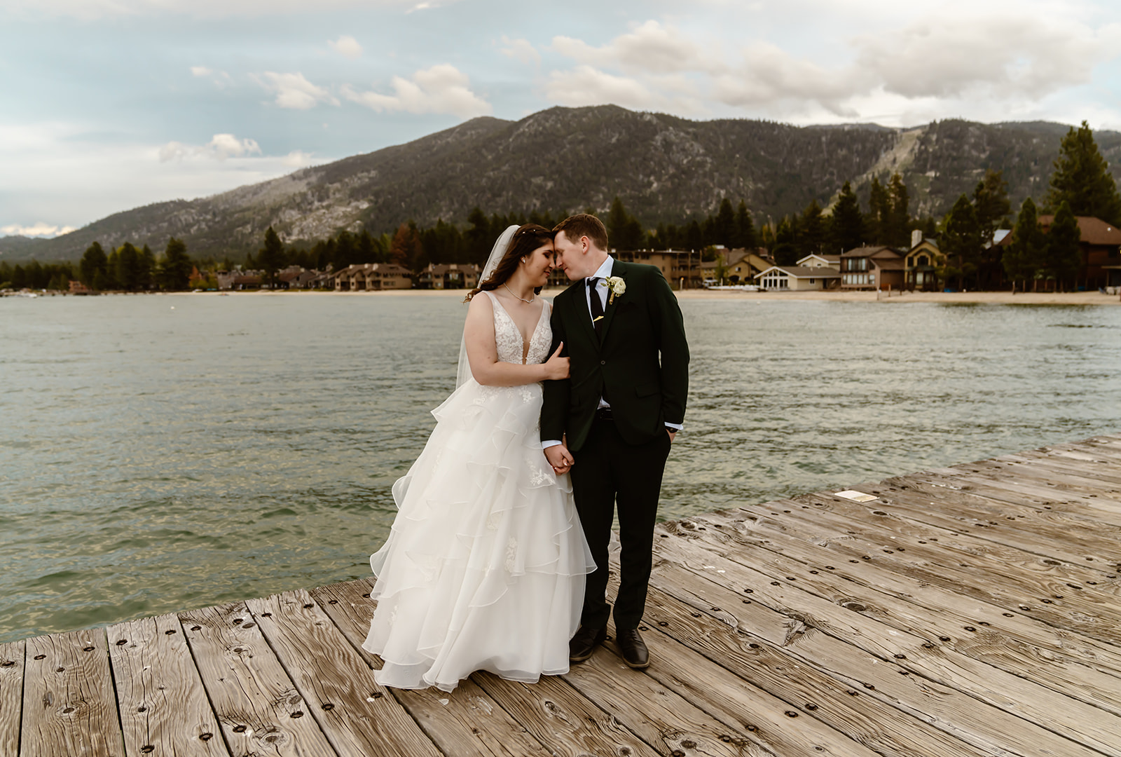 Bride and groom touch foreheads during Lake Tahoe wedding photos