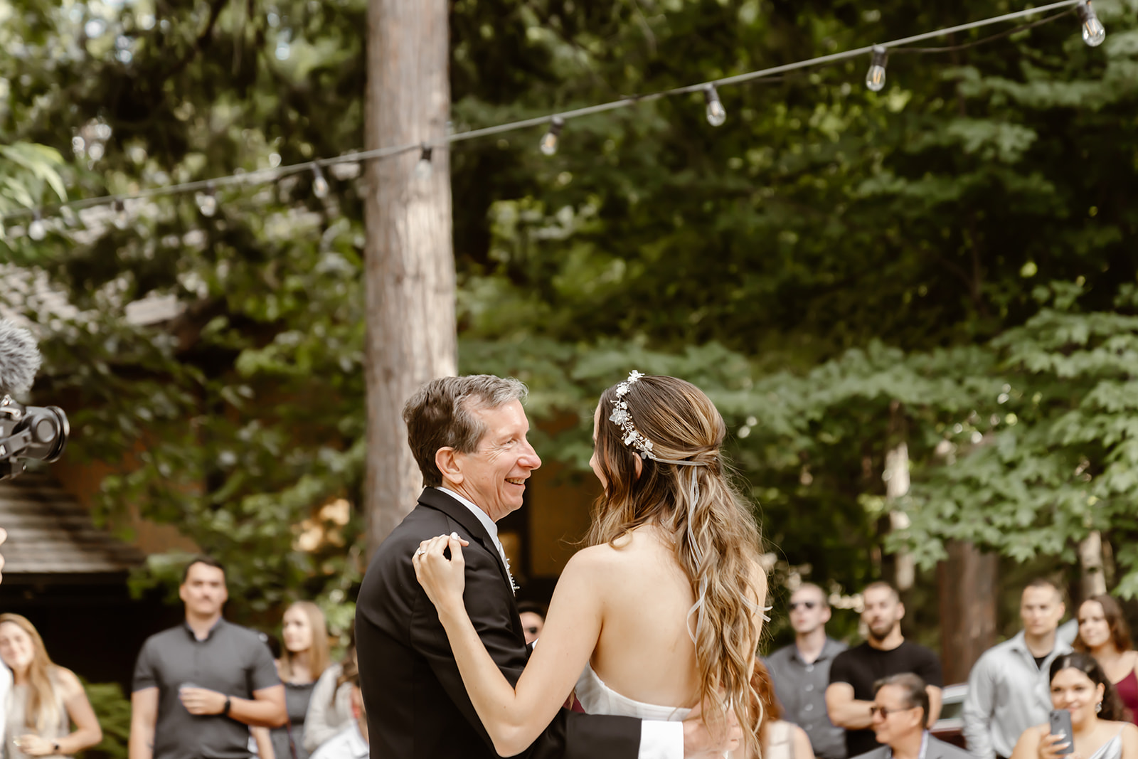 Bride dances with her dad at the Harmony Ridge Lodge wedding reception