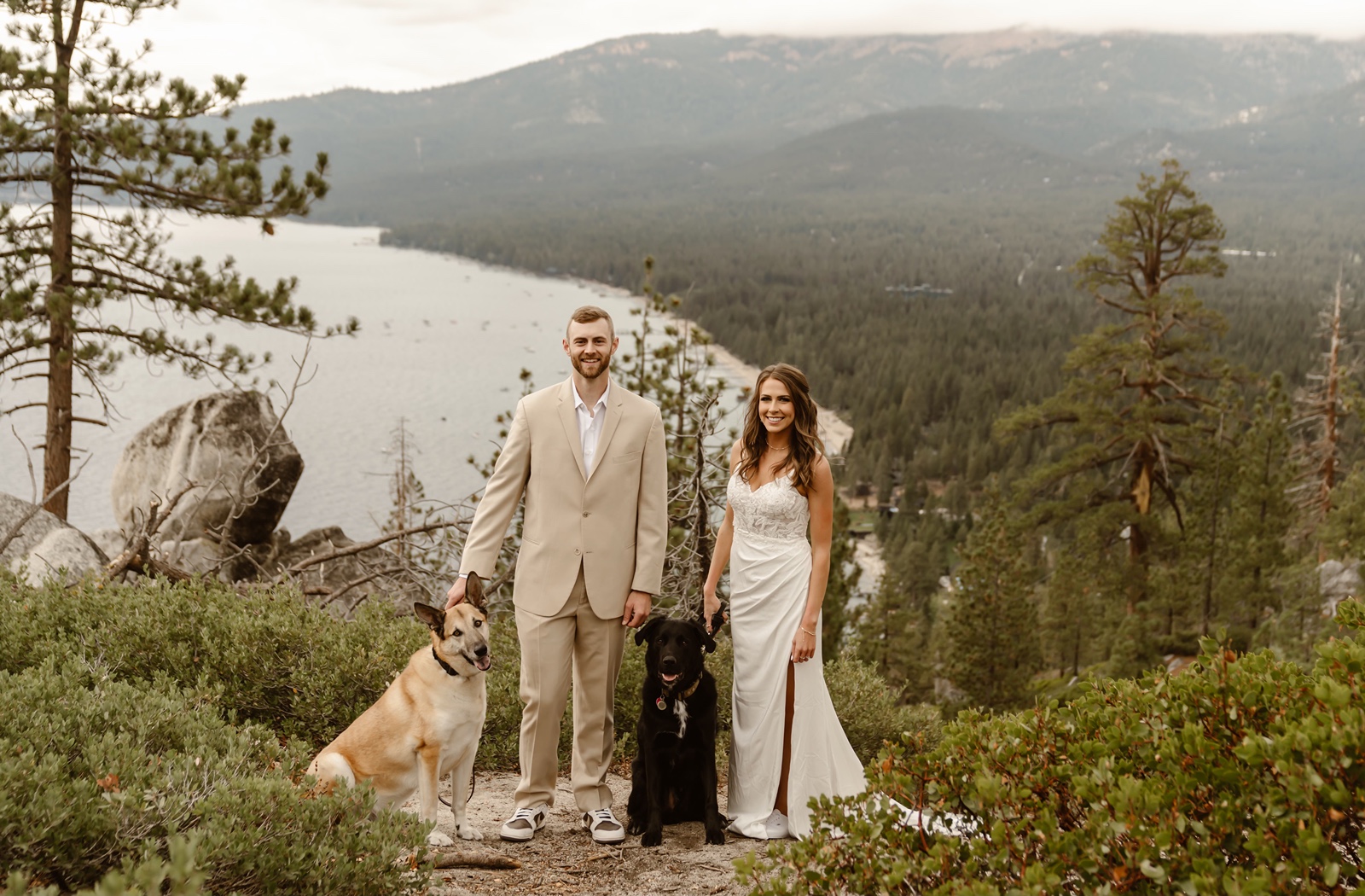 Couple with their dog at their Monkey Rock elopement