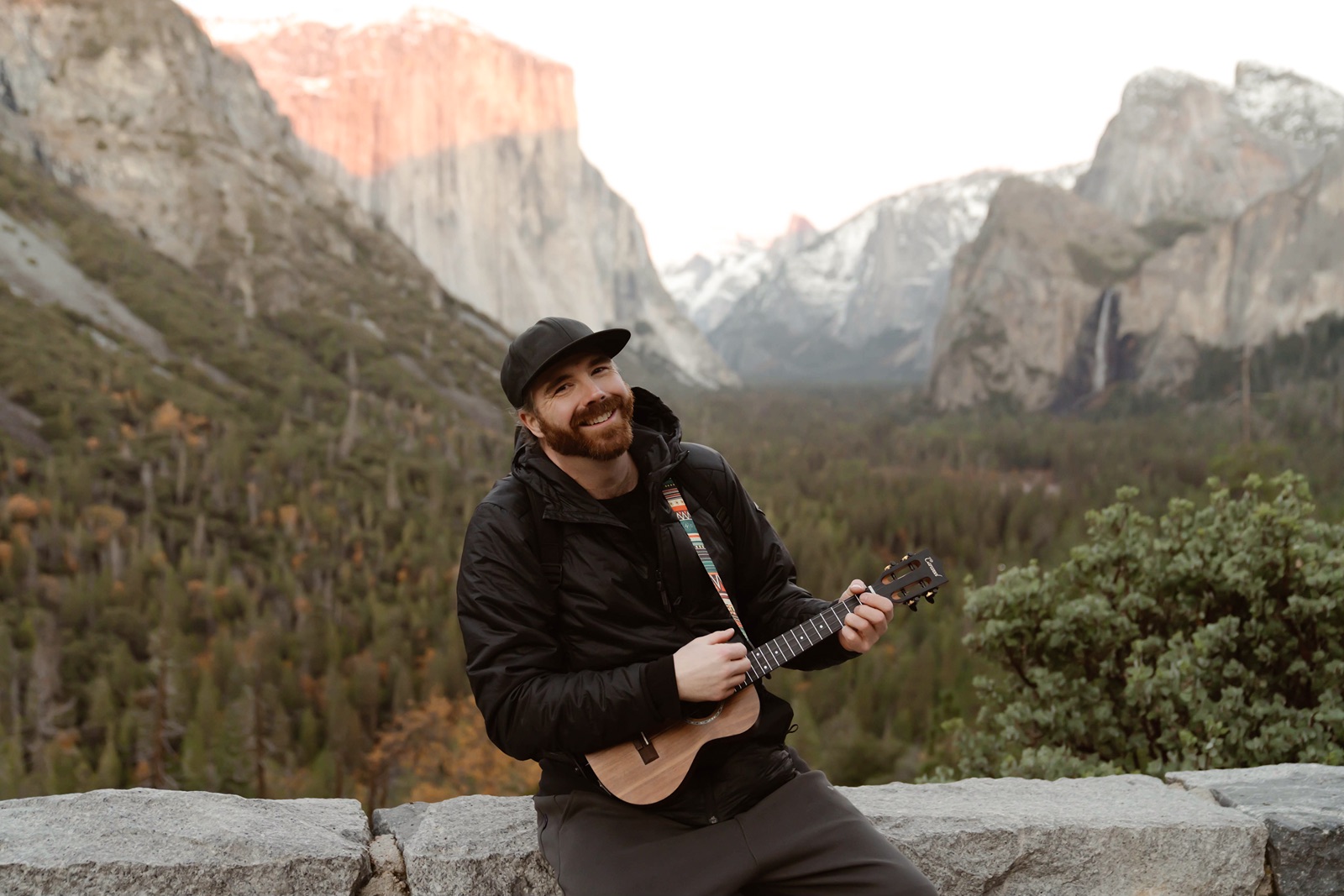 Elopement musician plays music at adventure elopement