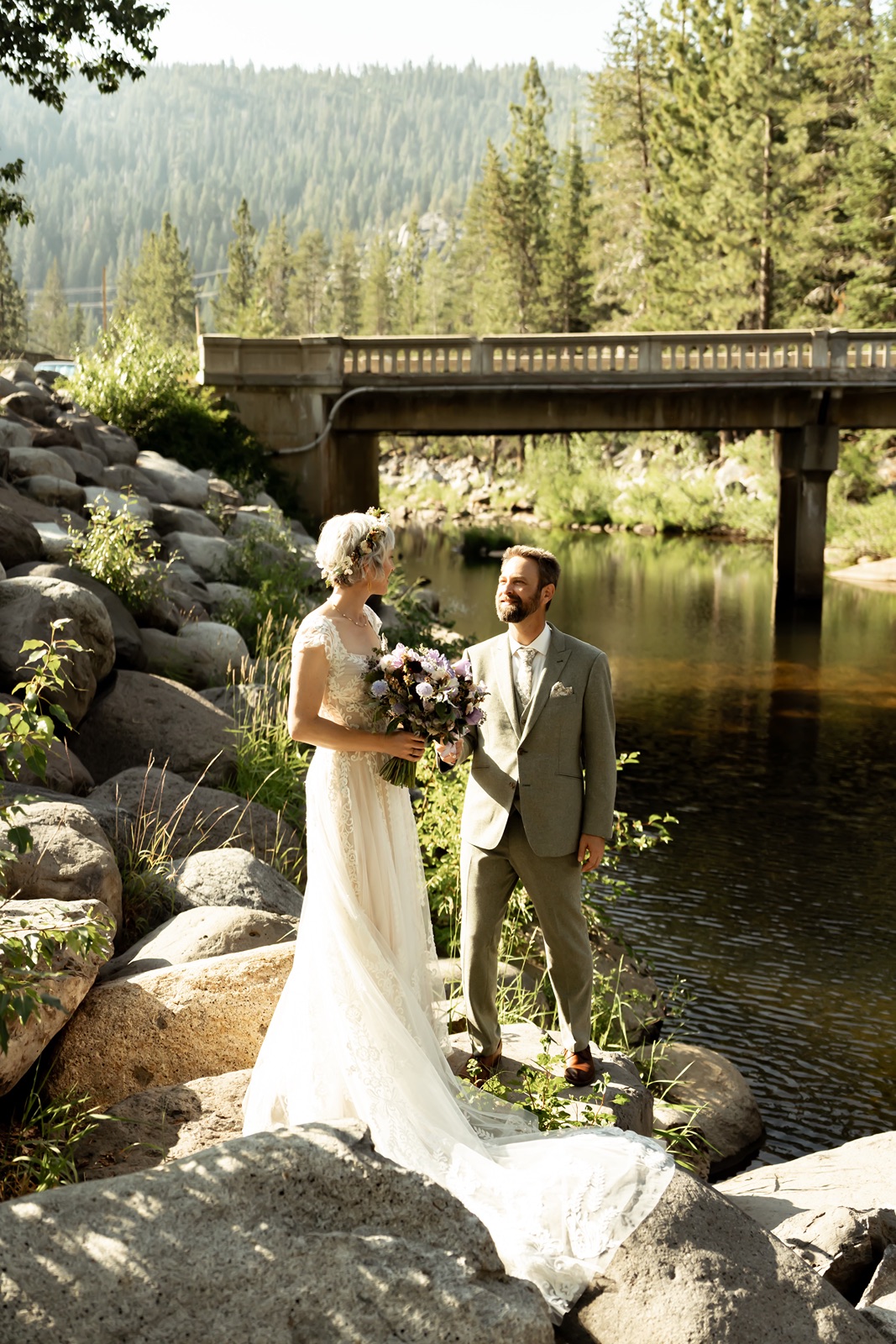 Bride and groom pose for portraits at Rainbow Lodge