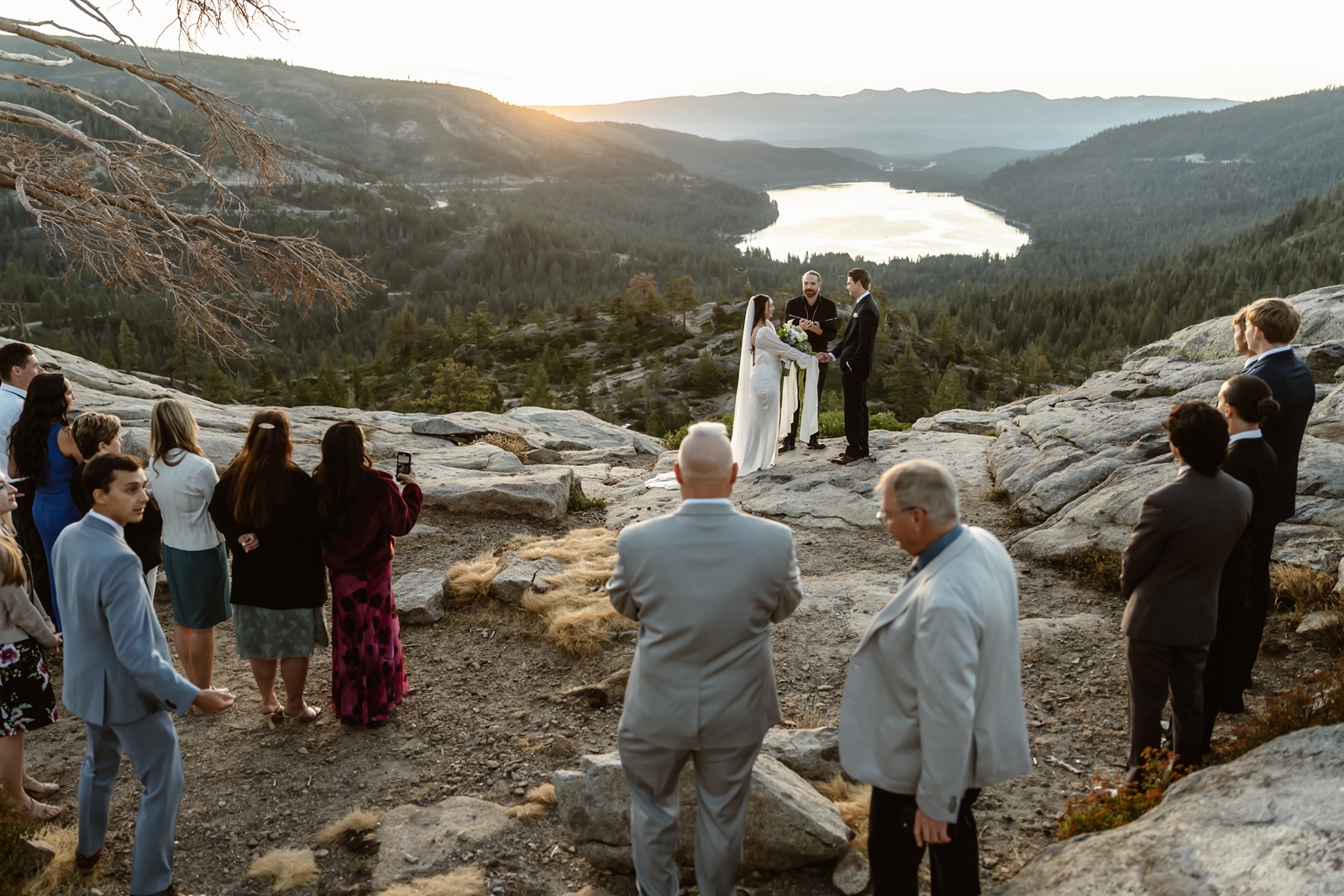 Guests watch on as couple says vows at Donner Lake Overlook wedding