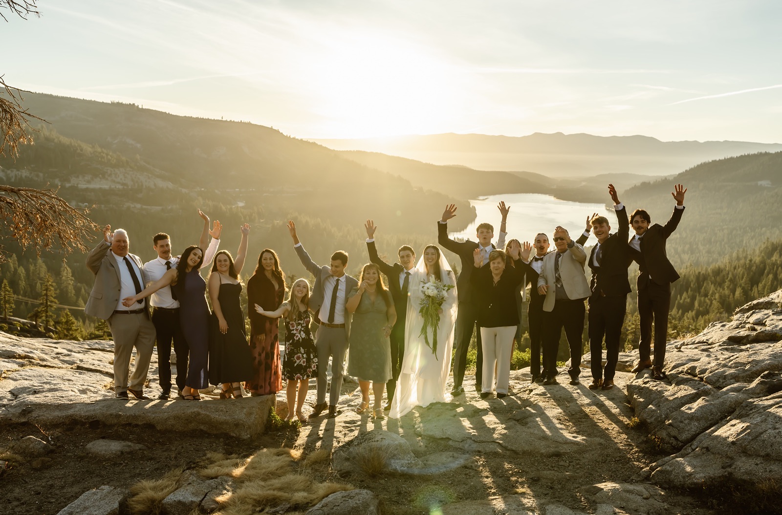 Couple with their 15 wedding guests at Donner Lake Overlook