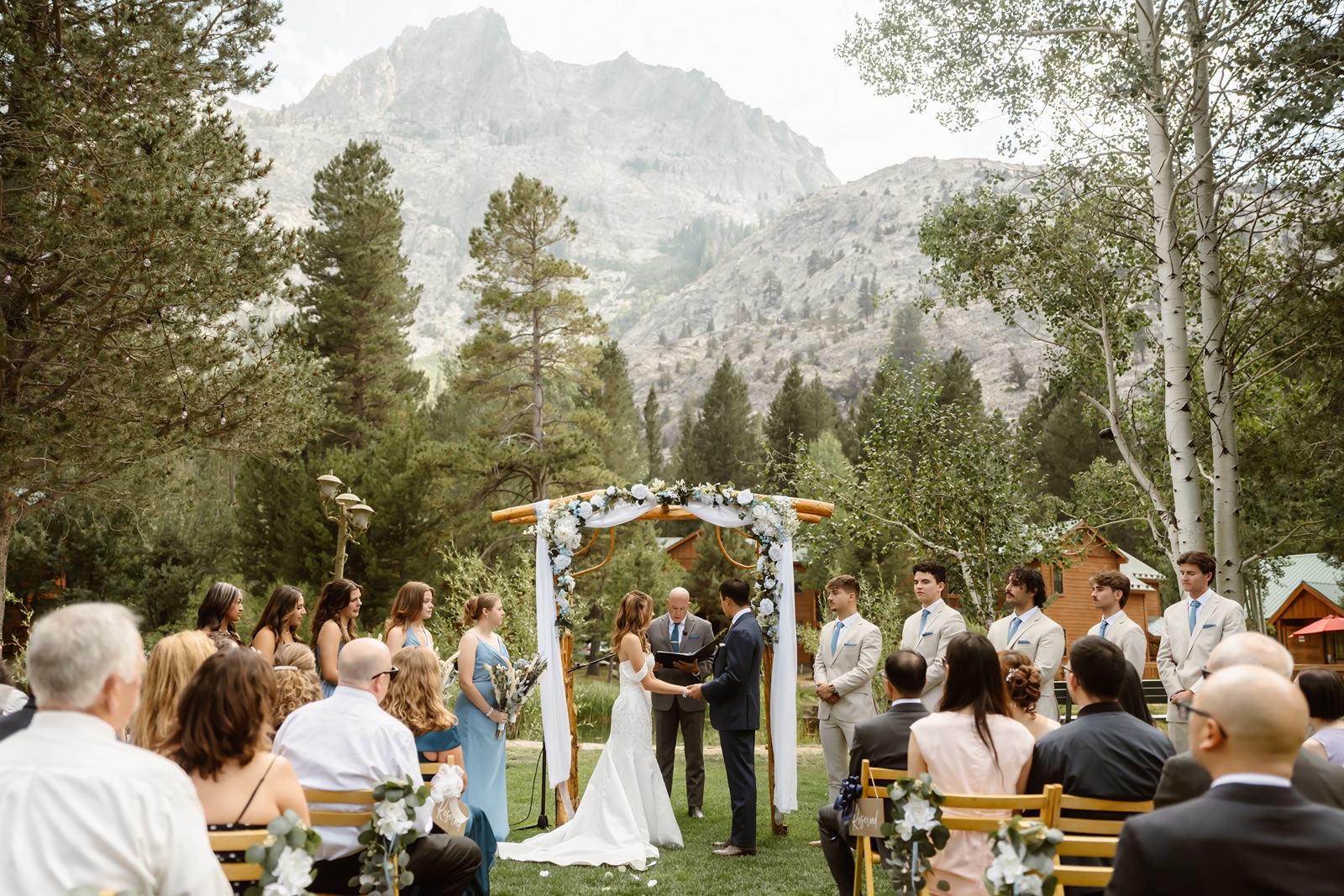 Bride and groom say vows as guests watch at Double Eagle Resort wedding
