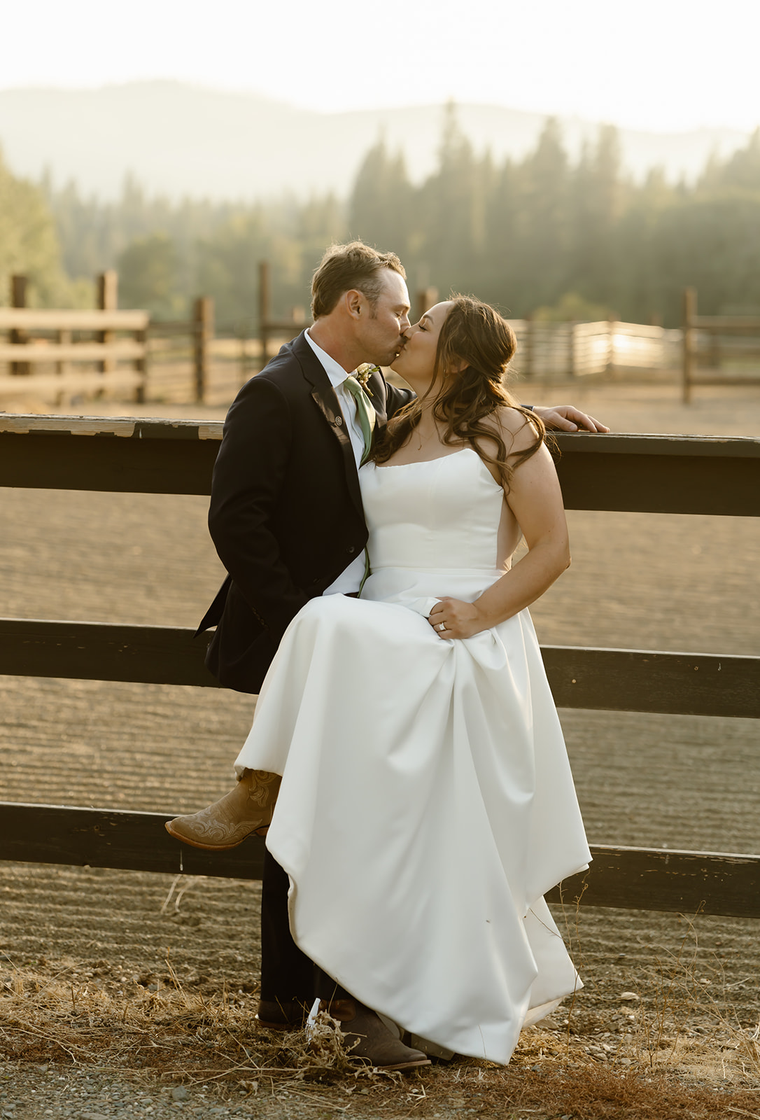 Bride and groom kiss at Greenhorn Ranch wedding