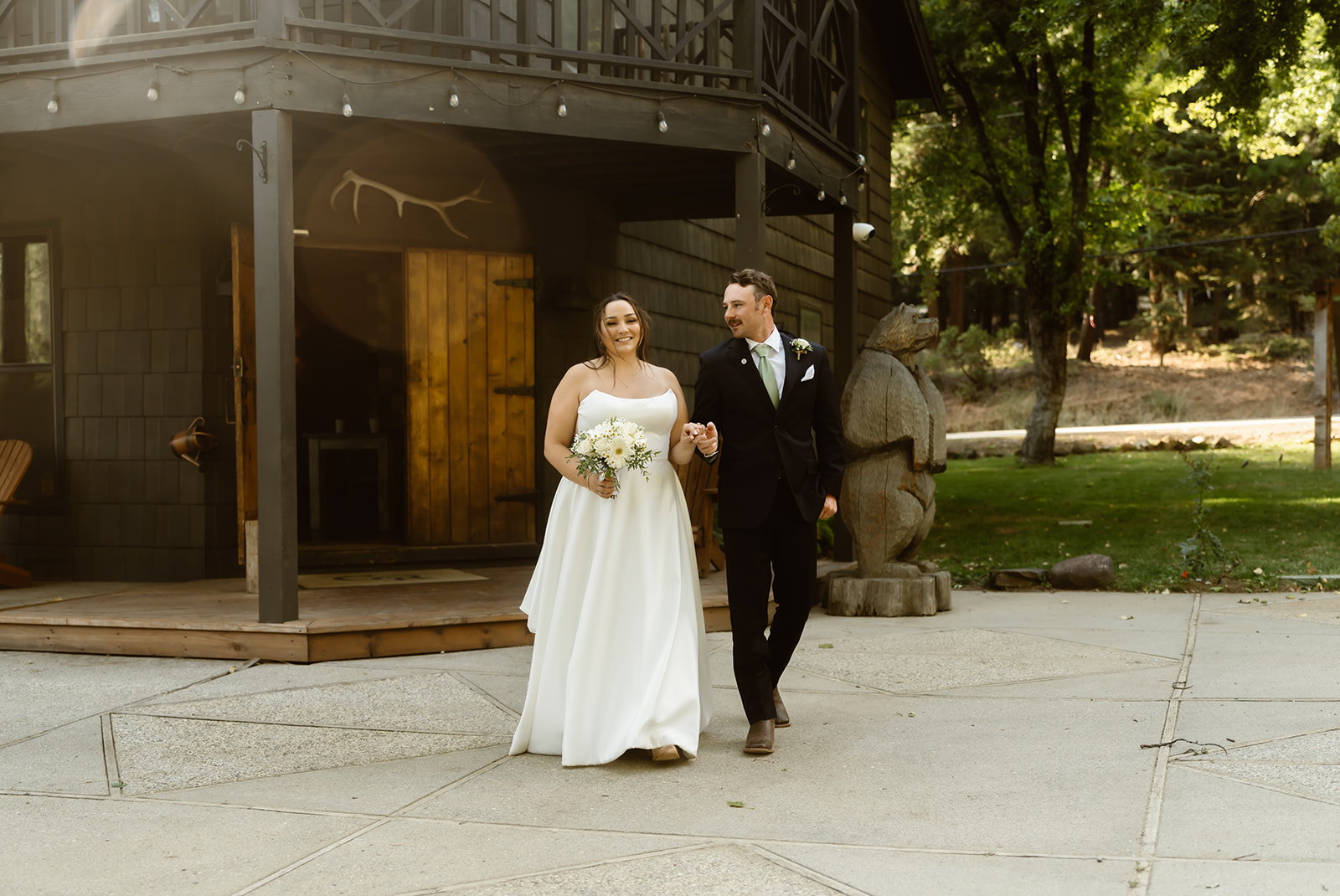Bride and groom walk together at Greenhorn Ranch