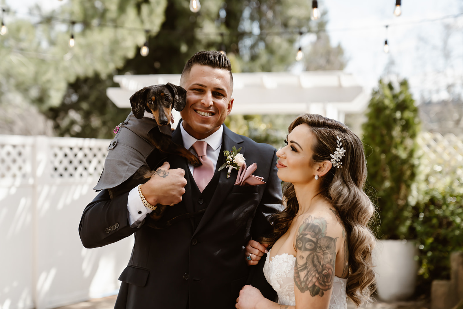 Bride and groom with their dog at Sequoia Mansion