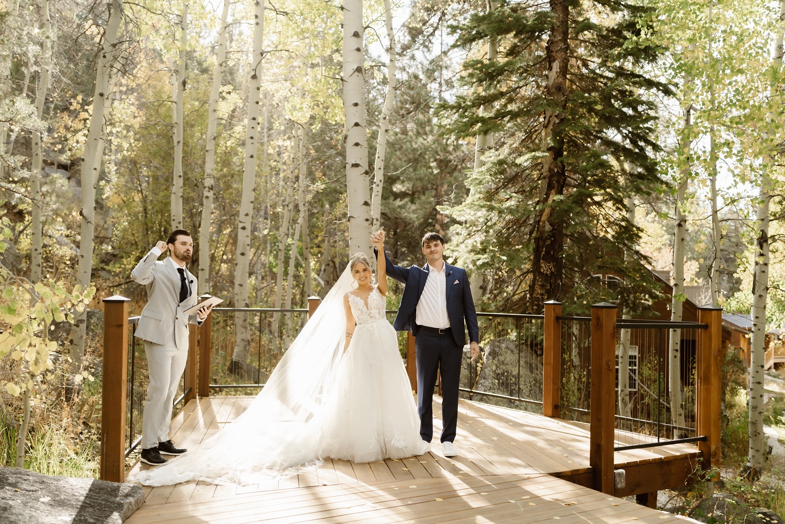 Excited bride and groom at outdoor Desolation Hotel wedding ceremony