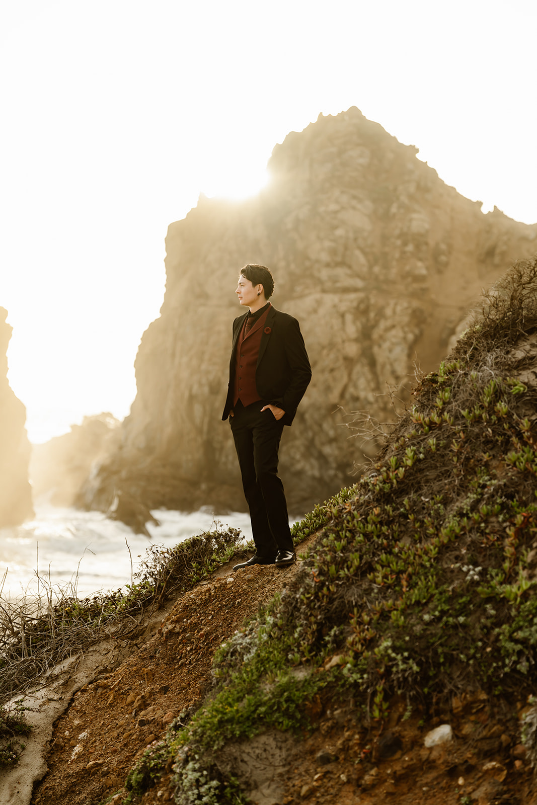 Groom on a cliff at Big Sur elopement