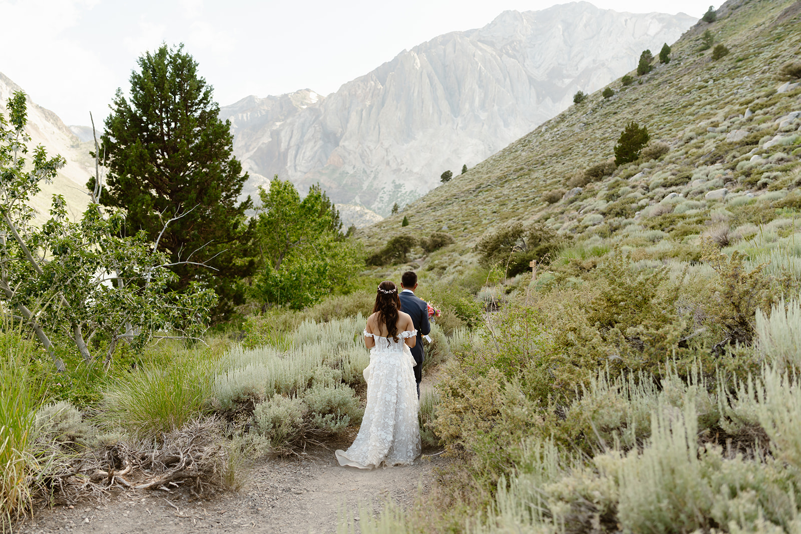 Bride and groom on a hike at their Mammoth Lakes wedding