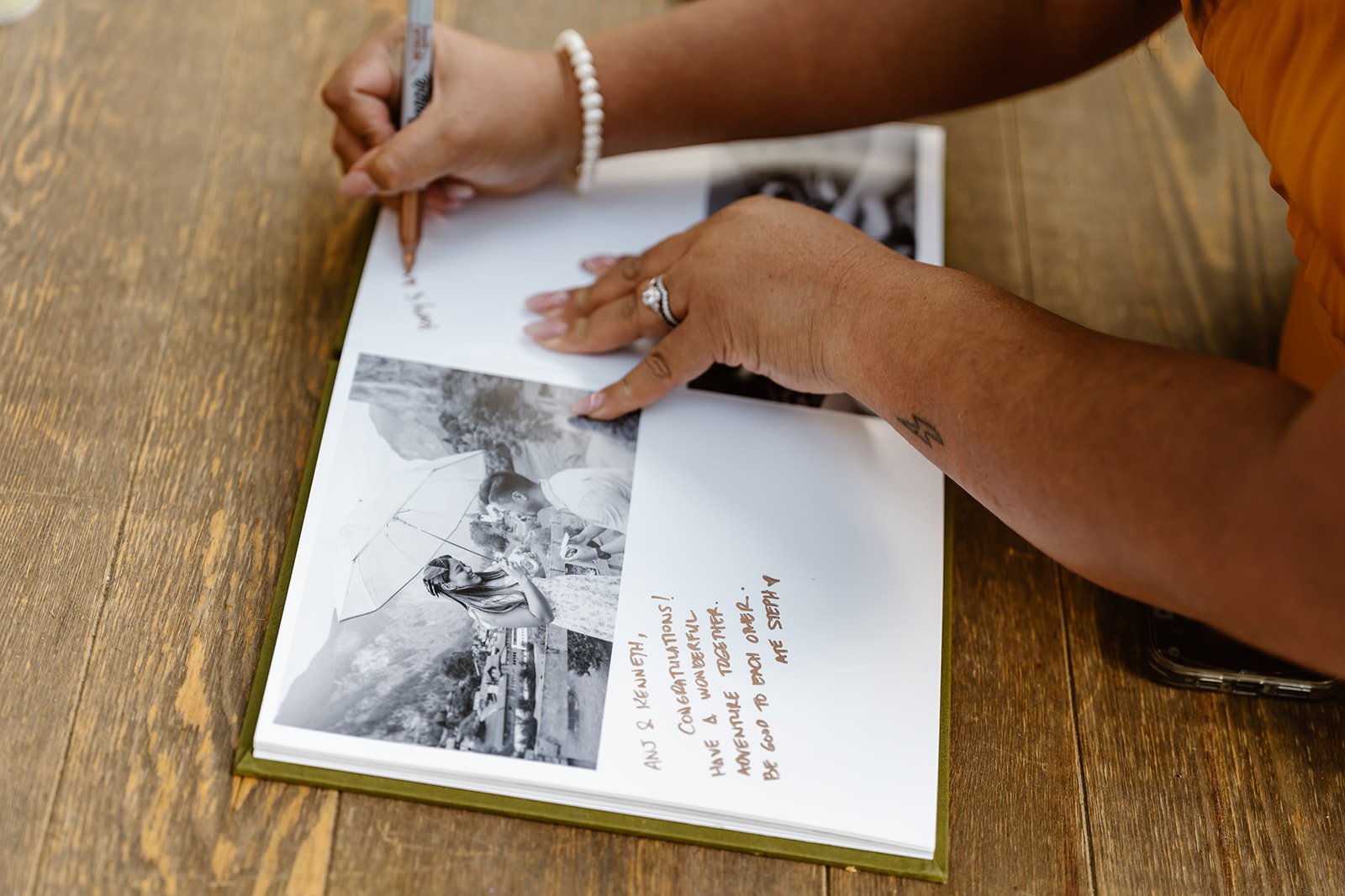Guest signing a guest book at the Mammoth Lakes wedding