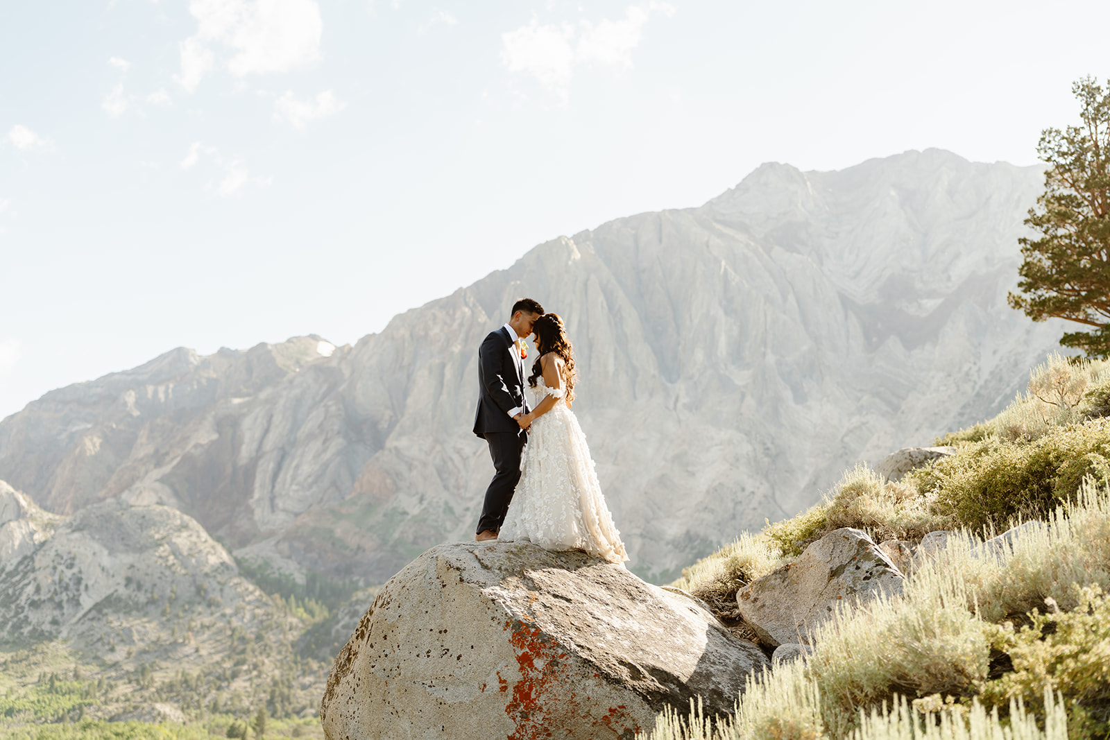 Bride and groom pose on their wedding hike in Mammoth Lakes