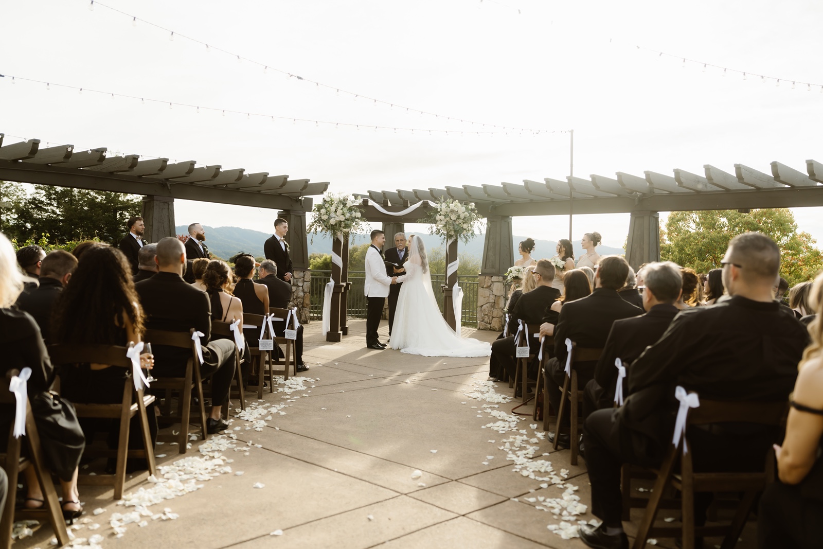 Bride and groom say their vows in outdoor ceremony at Stonetree Estate