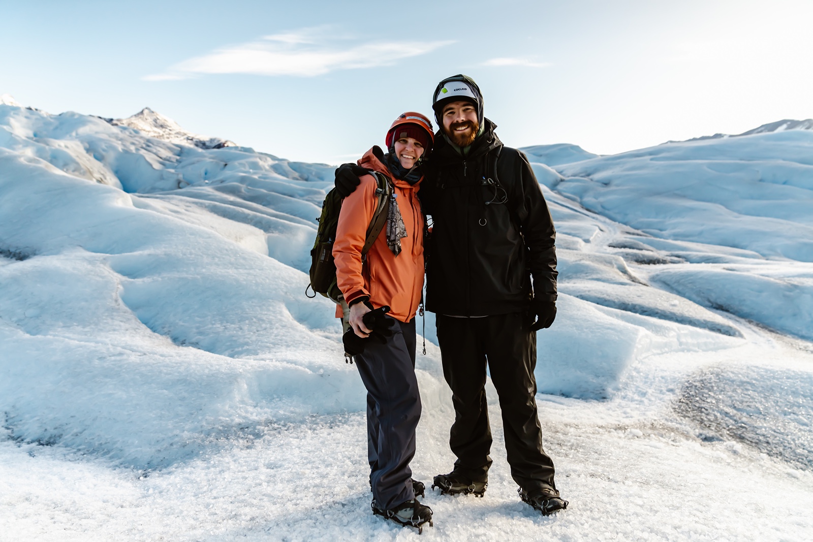 Man and woman at a glacier in Patagonia